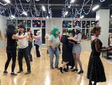 People dancing at a costume party